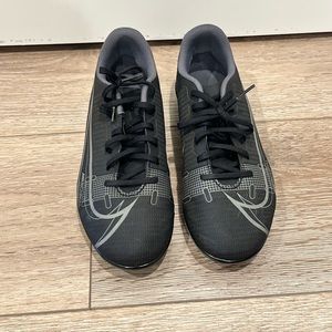 Brand new kids cleats (fits adult size 6.5!)